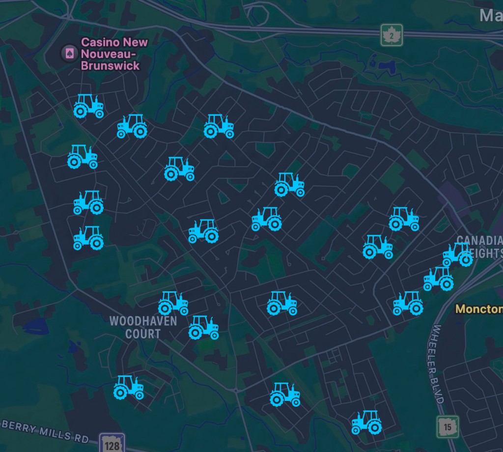 Live map of Choreguys tractors spread across Moncton neighbourhoods, including Woodhaven Court and Wheeler Boulevard